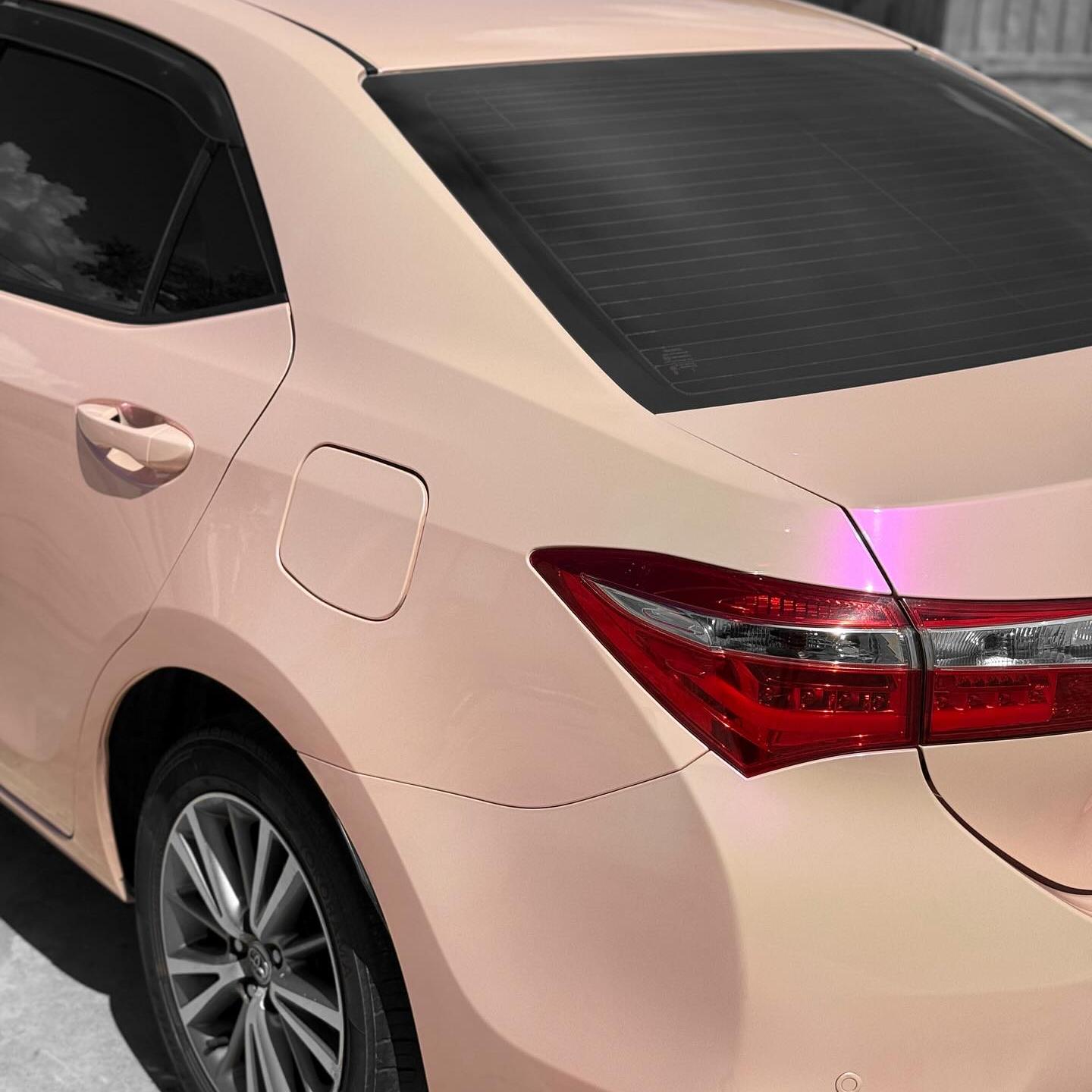 pink and purple car wrap